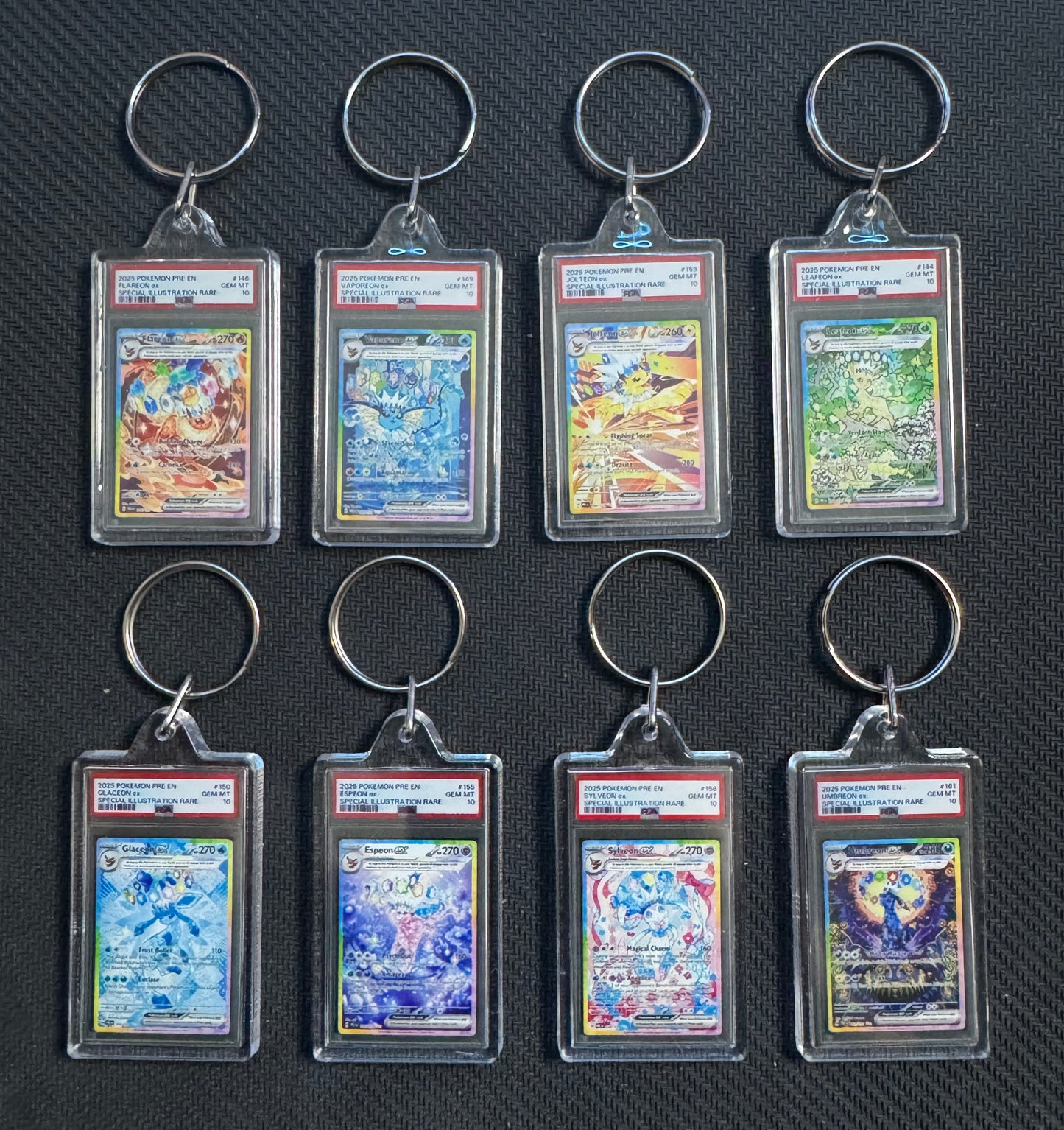 Prismatic evolutions keychain lot